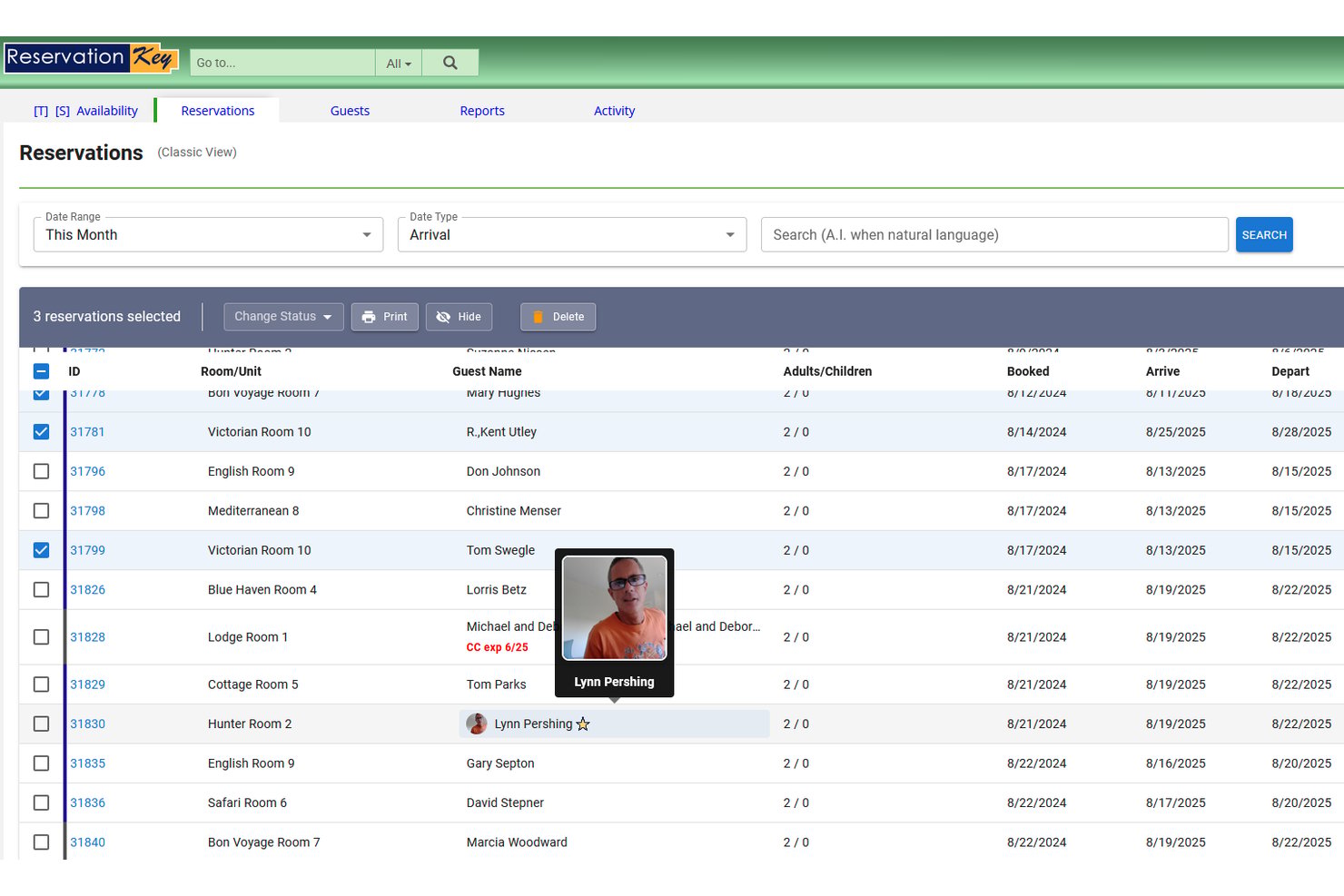 ReservationKey displays a classic reservations list view with guest details, room assignments, and arrival/departure dates.