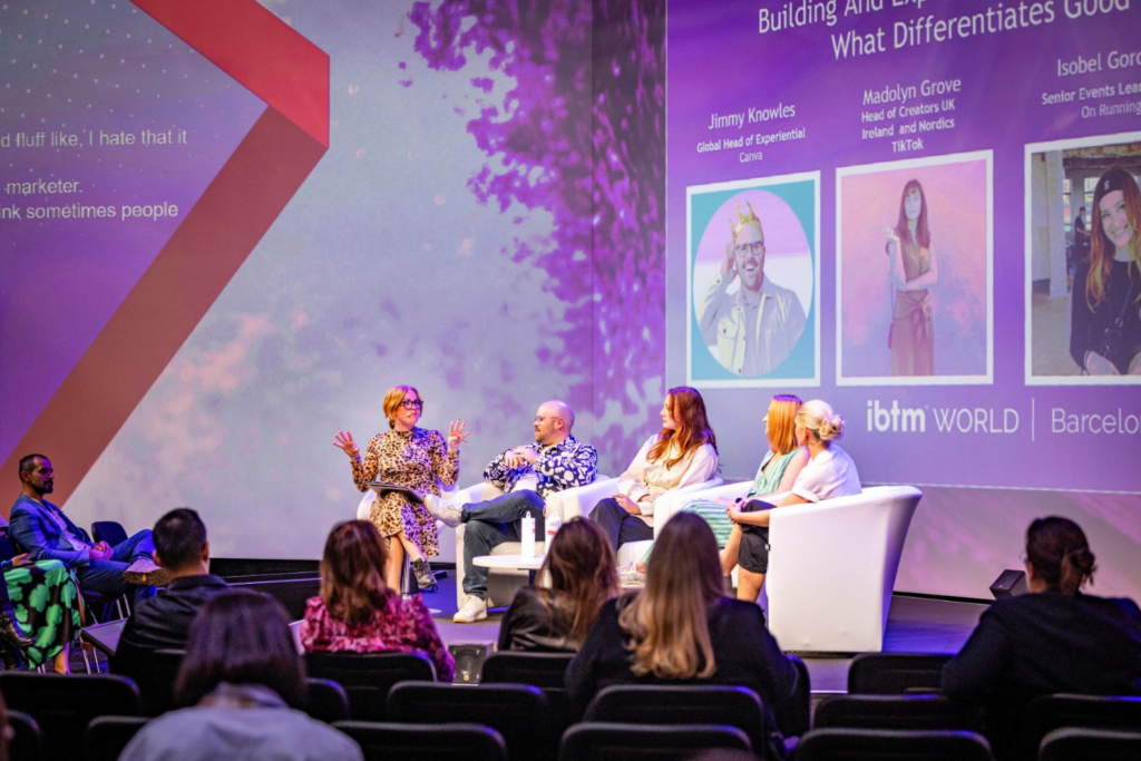 Panel discussion session at IBTM World with speakers and attendees