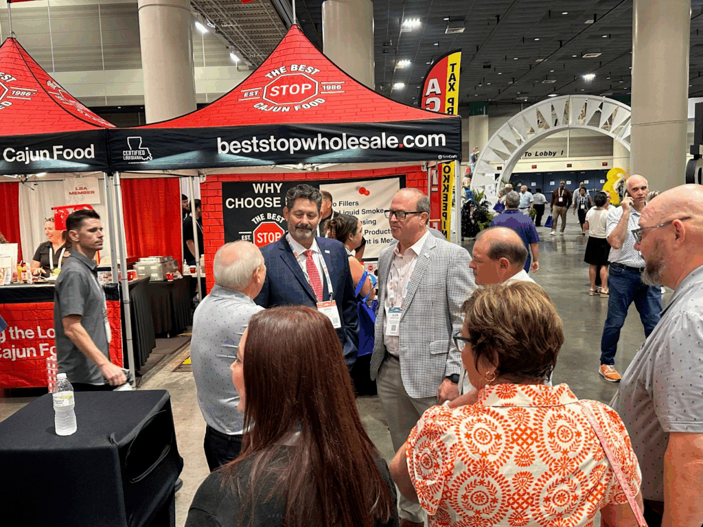 Attendees networking at exhibitor booths during the LRA Showcase event