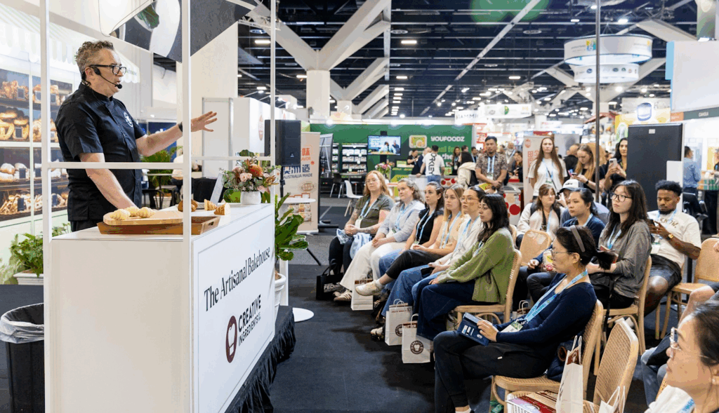 Chef presenting a live cooking demonstration at Fine Food Australia